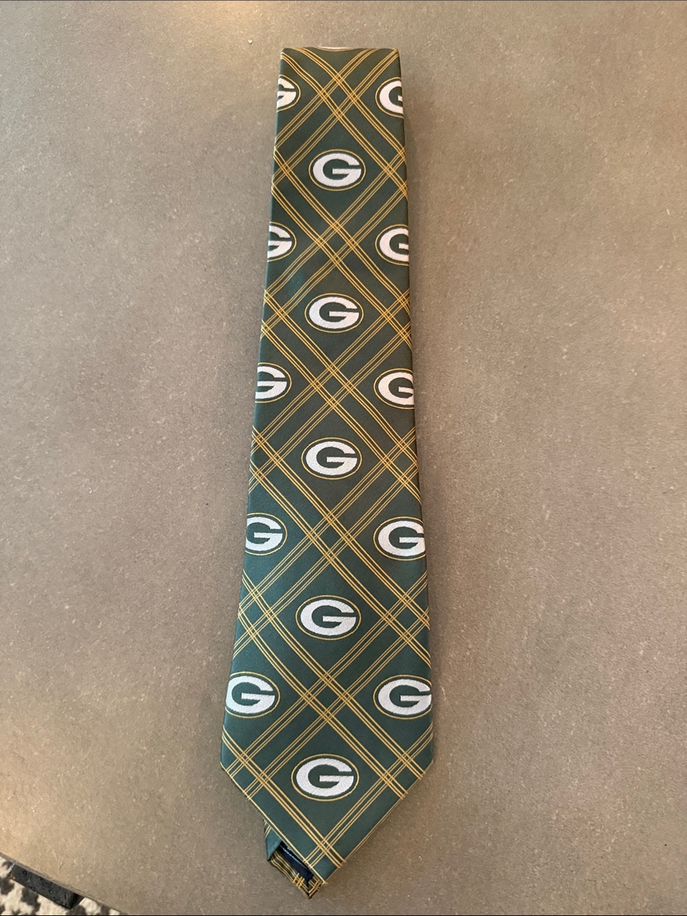 NFL Green and Gold Plaid Tie with Repeated 'G' Emblems
